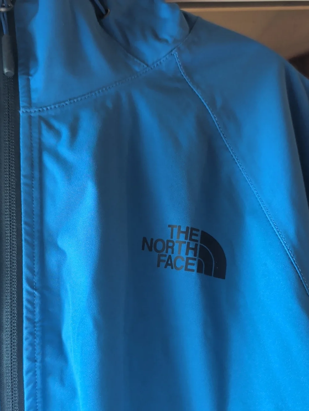The North Face Men’s Bright Blue Rain Jacket with Logo